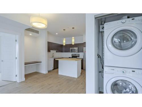 101-985 Academy Way, Kelowna, BC - Indoor Photo Showing Laundry Room