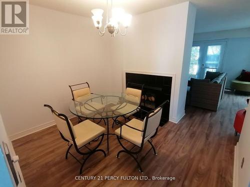 A11 - 1651 Nash Road, Clarington, ON - Indoor Photo Showing Dining Room With Fireplace