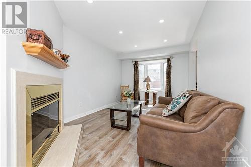 24 Havenhurst Crescent, Ottawa, ON - Indoor Photo Showing Living Room With Fireplace