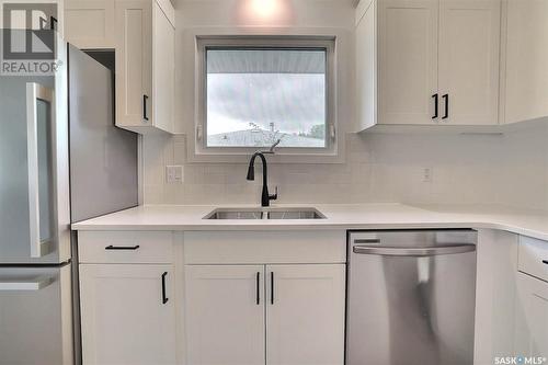 22 Brockelbank Crescent, Regina, SK - Indoor Photo Showing Kitchen With Double Sink