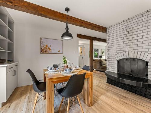 715 Salsbury Rd, Courtenay, BC - Indoor Photo Showing Dining Room With Fireplace