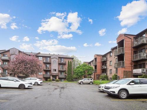 Parking - 8-830 Rue Hélène-Boullé, Boucherville, QC - Outdoor With Facade