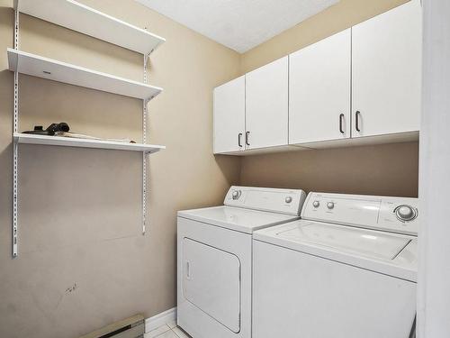 Salle de lavage - 8-830 Rue Hélène-Boullé, Boucherville, QC - Indoor Photo Showing Laundry Room