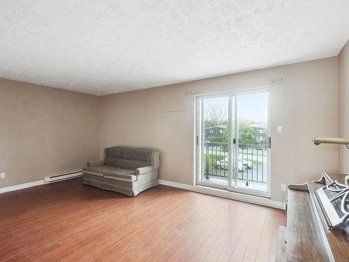 Living room - 8-830 Rue Hélène-Boullé, Boucherville, QC - Indoor Photo Showing Other Room