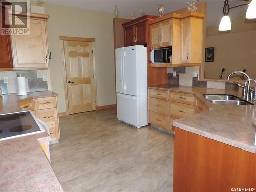 21 Leibel Bay, Balgonie, SK - Indoor Photo Showing Kitchen With Double Sink