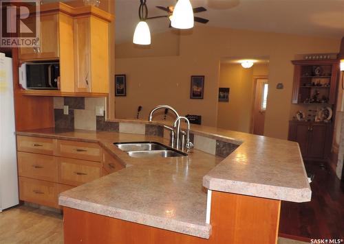 21 Leibel Bay, Balgonie, SK - Indoor Photo Showing Kitchen With Double Sink