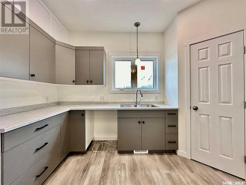 222 K Avenue S, Saskatoon, SK - Indoor Photo Showing Kitchen With Double Sink