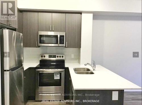 203 - 65 Shipway Avenue, Clarington, ON - Indoor Photo Showing Kitchen With Stainless Steel Kitchen With Double Sink With Upgraded Kitchen