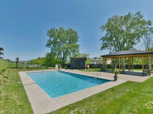 Pool - 106-41 Rue Simon-Lussier, Blainville, QC - Outdoor With In Ground Pool With Backyard