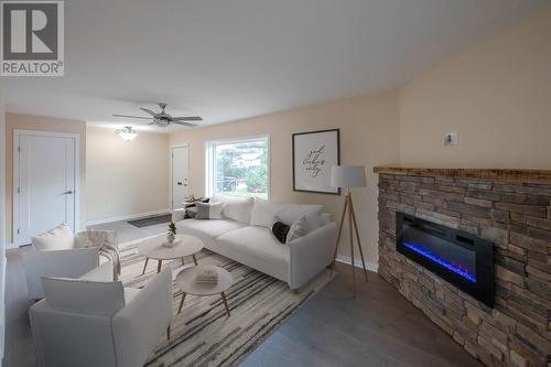 1815 Fairford Drive, Penticton, BC - Indoor Photo Showing Living Room With Fireplace