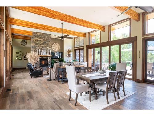 6133 Pippers Lane, Nelson, BC - Indoor Photo Showing Dining Room With Fireplace