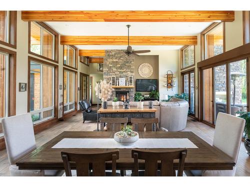 6133 Pippers Lane, Nelson, BC - Indoor Photo Showing Dining Room With Fireplace