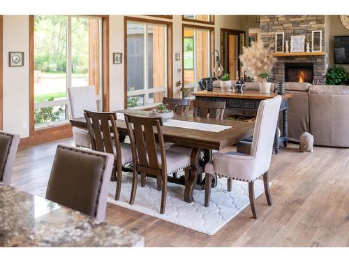 6133 Pippers Lane, Nelson, BC - Indoor Photo Showing Dining Room With Fireplace