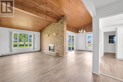4421 Gleeson Line, Chatham-Kent, ON - Indoor Photo Showing Living Room With Fireplace
