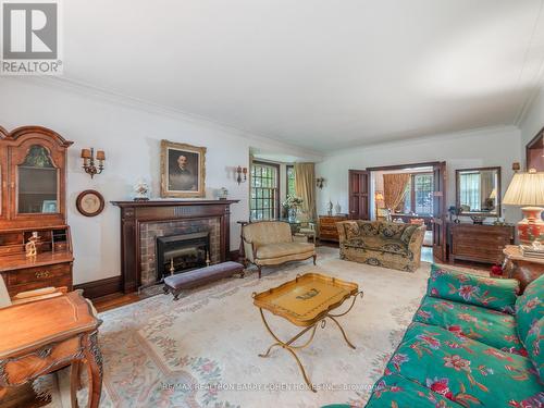 2639 Lake Shore Boulevard W, Toronto, ON - Indoor Photo Showing Living Room With Fireplace