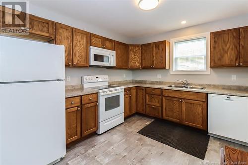 21 Park Avenue, St. Martins, NB - Indoor Photo Showing Kitchen With Double Sink