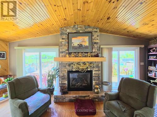 288 White Water Road, Pembroke, ON - Indoor Photo Showing Living Room With Fireplace