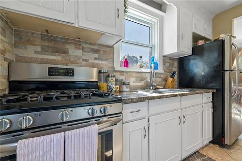 161 East 34Th Street, Hamilton, ON - Indoor Photo Showing Kitchen With Double Sink