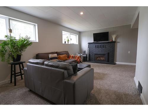 239 107Th Avenue, Kimberley, BC - Indoor Photo Showing Living Room With Fireplace