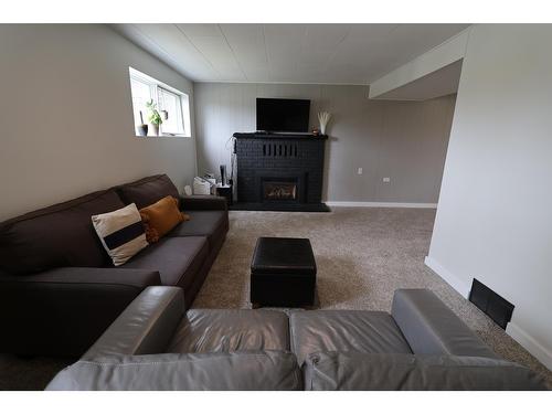 239 107Th Avenue, Kimberley, BC - Indoor Photo Showing Living Room With Fireplace