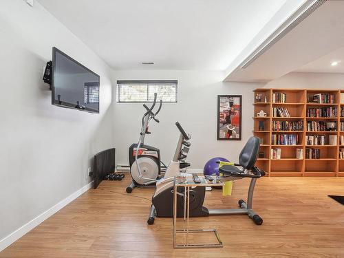 Family room - 396 Rue Des Camélias, Sainte-Thérèse, QC - Indoor Photo Showing Gym Room