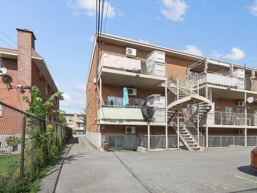 Back facade - 9446 Av. Vianney, Montréal (Villeray/Saint-Michel/Parc-Extension), QC - Outdoor With Balcony