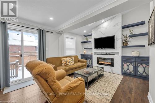 153 Ottawa Street S, Hamilton, ON - Indoor Photo Showing Living Room With Fireplace