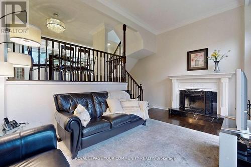 56 Carnival Court, Toronto, ON - Indoor Photo Showing Living Room With Fireplace