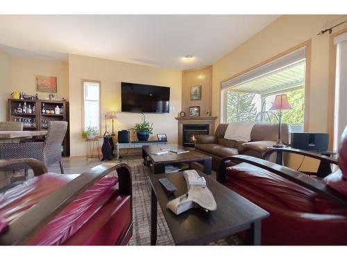 3329 Mt Fisher Drive, Cranbrook, BC - Indoor Photo Showing Living Room With Fireplace