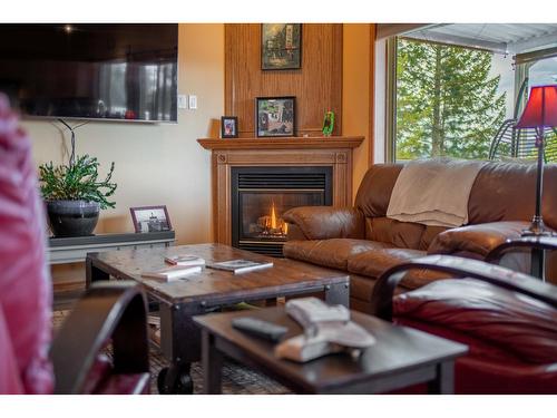 3329 Mt Fisher Drive, Cranbrook, BC - Indoor Photo Showing Living Room With Fireplace