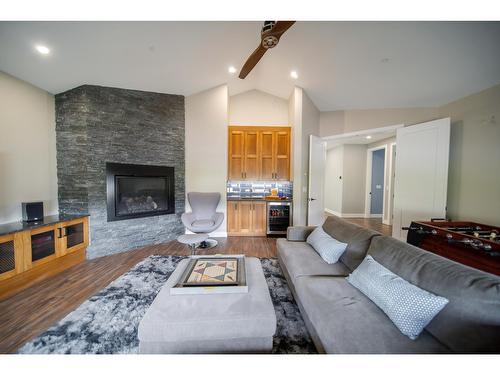 1574 Koocanusa Lake Drive, Lake Koocanusa, BC - Indoor Photo Showing Living Room With Fireplace