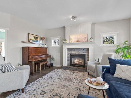 1590 West Kelowna Road, West Kelowna, BC - Indoor Photo Showing Living Room With Fireplace