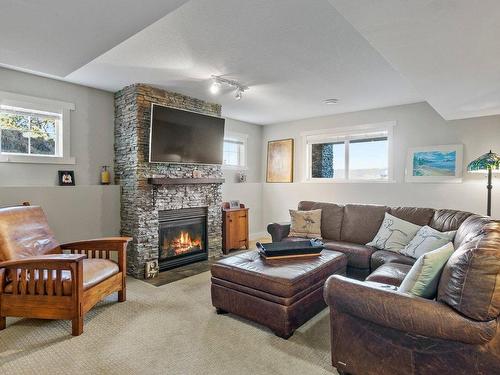 1590 West Kelowna Road, West Kelowna, BC - Indoor Photo Showing Living Room With Fireplace