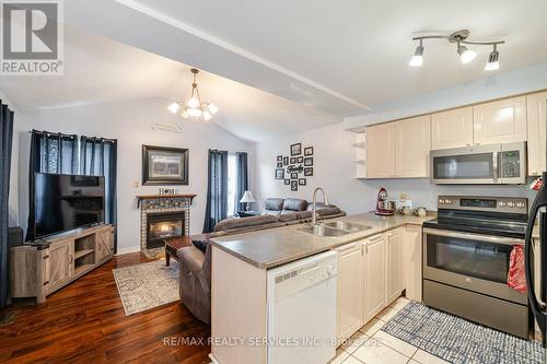 434 Jay Crescent, Orangeville, ON - Indoor Photo Showing Kitchen With Fireplace With Double Sink
