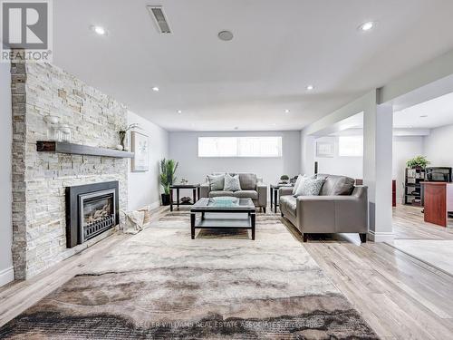 4 Rapallo Mews, Mississauga, ON - Indoor Photo Showing Living Room With Fireplace