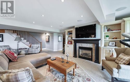 215 Southcrest Drive, Kawartha Lakes, ON - Indoor Photo Showing Living Room With Fireplace