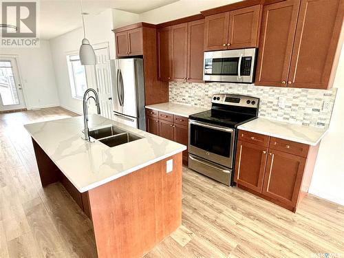 527 Evergreen Boulevard, Saskatoon, SK - Indoor Photo Showing Kitchen With Double Sink With Upgraded Kitchen