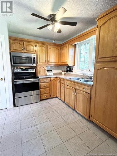 97 University Avenue, Chatham, NB - Indoor Photo Showing Kitchen With Double Sink