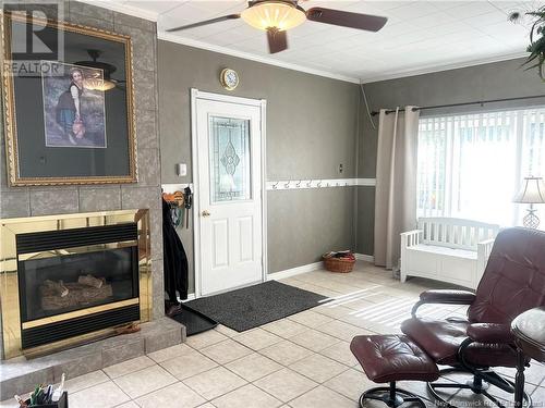 97 University Avenue, Chatham, NB - Indoor Photo Showing Living Room With Fireplace