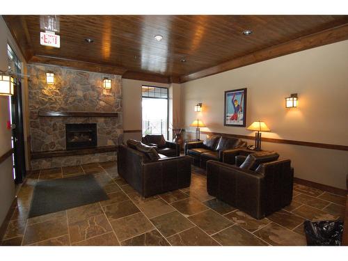 107 - 1545 Kicking Horse Trail, Golden, BC - Indoor With Fireplace