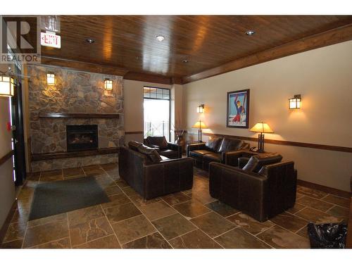 1545 Kicking Horse Trail Unit# 107, Golden, BC - Indoor With Fireplace