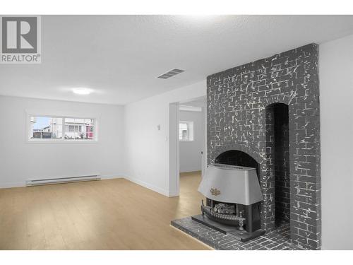 43 Sparks Avenue, Kitimat, BC - Indoor Photo Showing Other Room With Fireplace