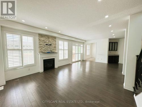 7646 Goldenrod Trail, Niagara Falls, ON - Indoor Photo Showing Living Room With Fireplace