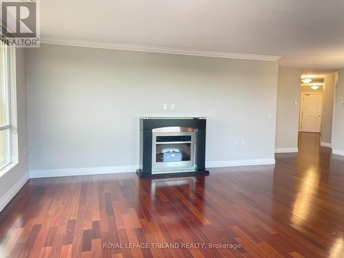 804 - 250 Pall Mall Street, London, ON - Indoor Photo Showing Living Room With Fireplace