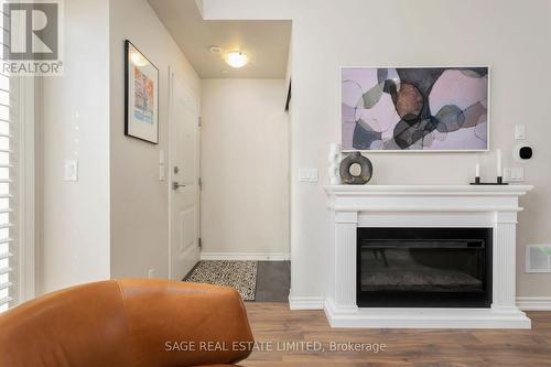 5 - 80 Eastwood Park Gardens, Toronto, ON - Indoor Photo Showing Living Room With Fireplace