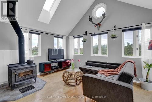 1727 County 14 Road, Prince Edward County, ON - Indoor Photo Showing Living Room With Fireplace