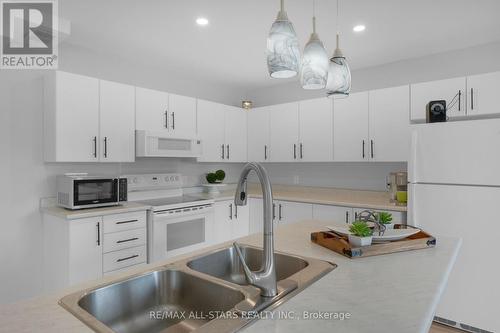 132 Newkirk Boulevard, Bancroft, ON - Indoor Photo Showing Kitchen With Double Sink