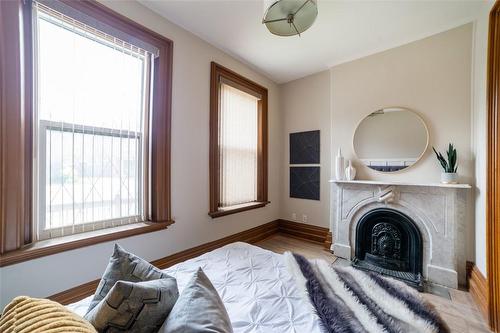 82 Victoria Avenue S, Hamilton, ON - Indoor With Fireplace