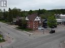 488 Main Street, Powassan, ON  - Outdoor With Facade 