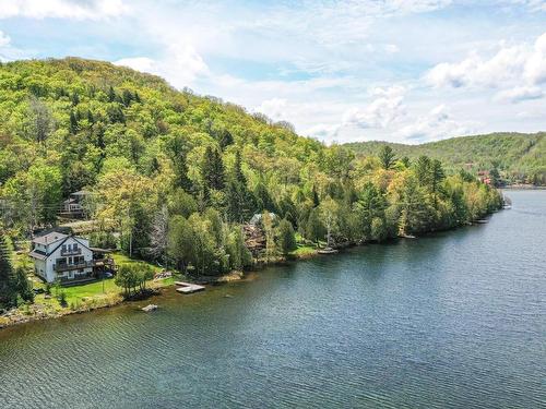 Aerial photo - 53 Ch. Du Lac-Morency, Saint-Hippolyte, QC - Outdoor With Body Of Water With View